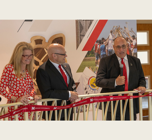 Miami ambassador Dr. Renate Crawford and Miami University President Gregory Crawford listen to Miami Tribe of Oklahoma Chief Douglas Lankford speak at the ribbon cutting in May 2024 for miloniteeheekaani, which means “the Myaamia classroom.”