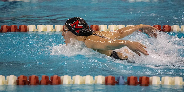 Miami University's Nicole Maier competes during a swimming and diving meet.