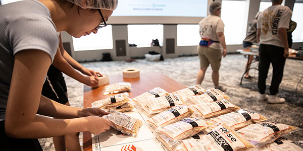 An estimated 175 Miami University students and Student Life staff help assembled meal packages for Rise Against Hunger as part of Welcome Weekend 2024 on Aug. 24 at Armstrong Student Center.