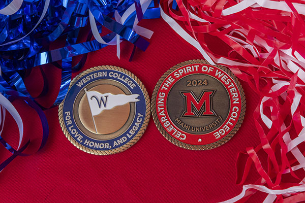 Special coins representing Western College and Miami University for Homecoming 2024