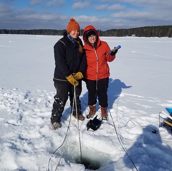 Lesley Knoll and another researcher on ice-covered Lake Itasca 