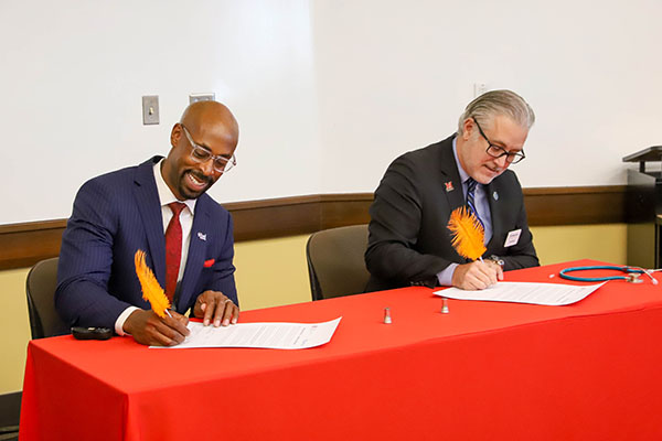 Ande Durojaiye, vice president of Miami University Regionals and dean of the College of Liberal Arts and Applied Science, and Jon Graft, superintendent and CEO of Butler Tech, have signed an agreement launching the groundbreaking 1+3 Nursing model.