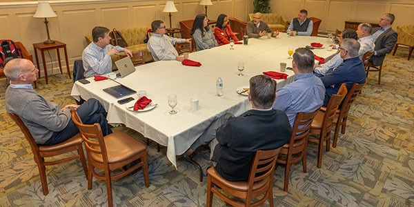 The Powell Industries leadership team meets with Miami University officials during a leadership retreat.