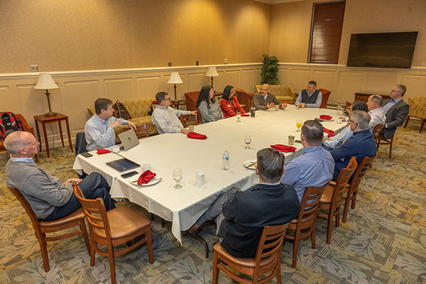 The Powell Industries leadership team meets with Miami University officials during a leadership retreat.