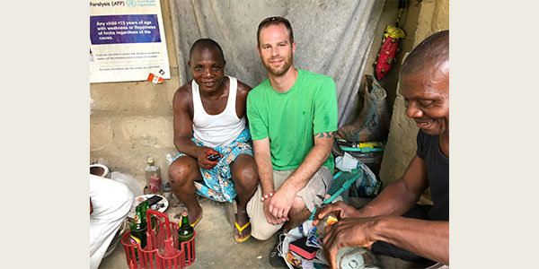 Jordan Fenton working with herbalist Chief Asuqua Effiong Effanga in Akpabuyo, Nigeria, 2018.