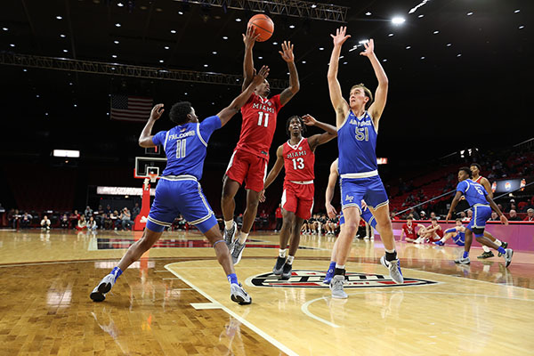 Miami University basketball players at Millett Hall