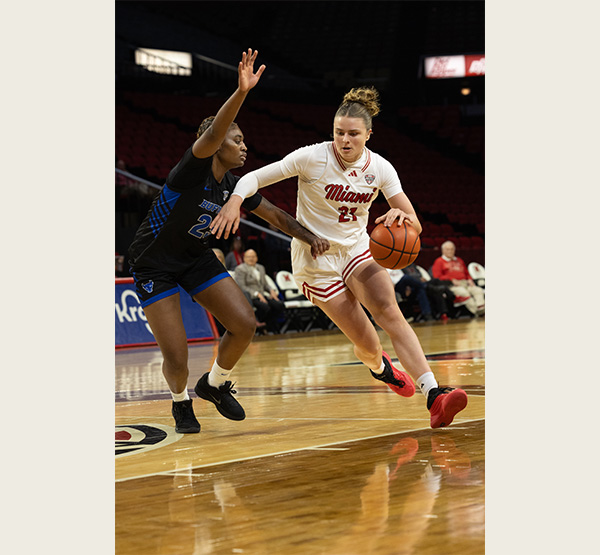 Ilse de Vries drives past a Buffalo player at Millett (photo by Scott Kissell).