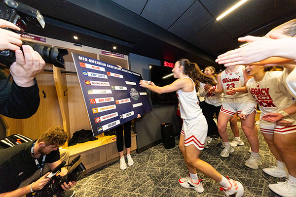 The Miami University women's basketball team celebrates 