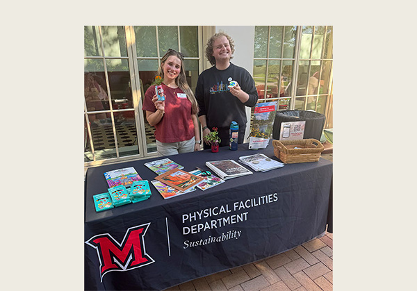 Alex Miller and John Day at office of sustainability tabling event 