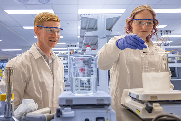 Andrew Jones, left, with a Miami University student
