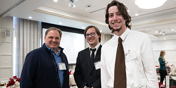 Douglas Coffin, left, with Miami University students
