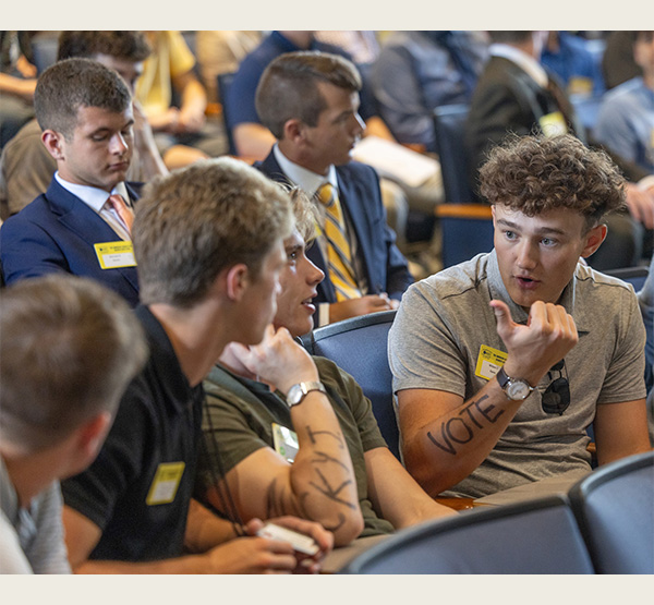 American Legion Buckeye Boys State delegates gather in the Benton Hall auditorium to talk about the election and candidates (photo by Scott Kissell).