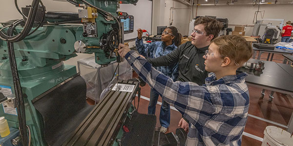 Students work at the Advanced Manufacturing Workforce and Innovation Hub